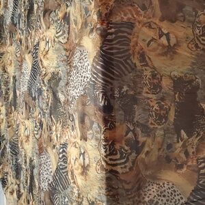 Window scarf with safari theme print in earth tones. 7' x5' sheer